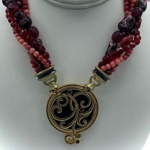 Beautiful various red beads and gold pendant